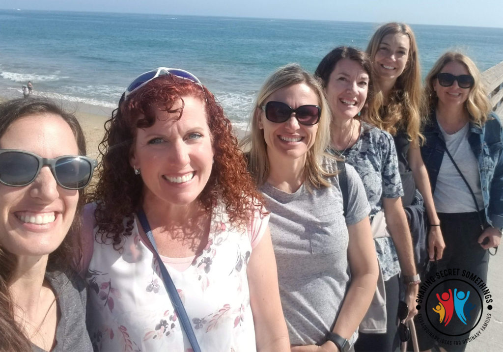 Sisters gathered at a pier for a weekend retreat