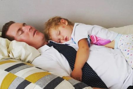 Dad and Daughter taking a little nap